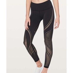 Lululemon Reveal Tight Aurora 25" Size 4 Black with pocket